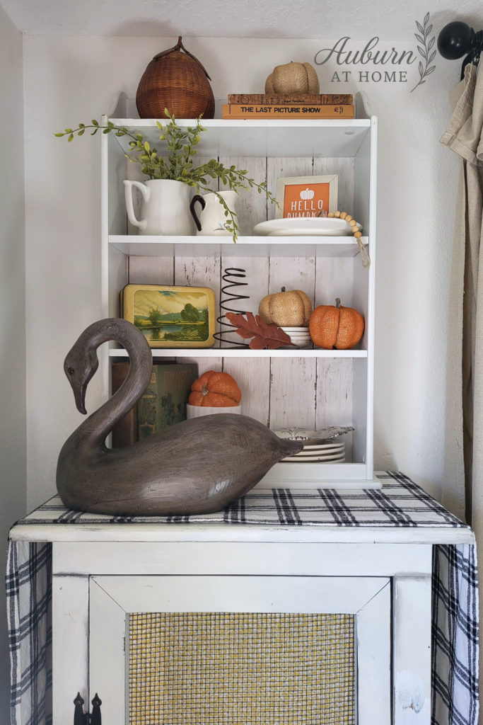 Vintage shelf styling. Thrifted shelf gets a makeover.