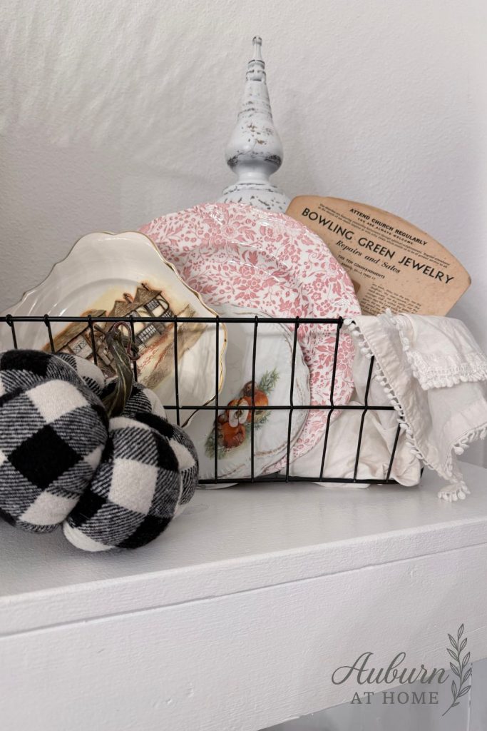 Farmhouse shelf with vintage ironstone plate and currier and ives