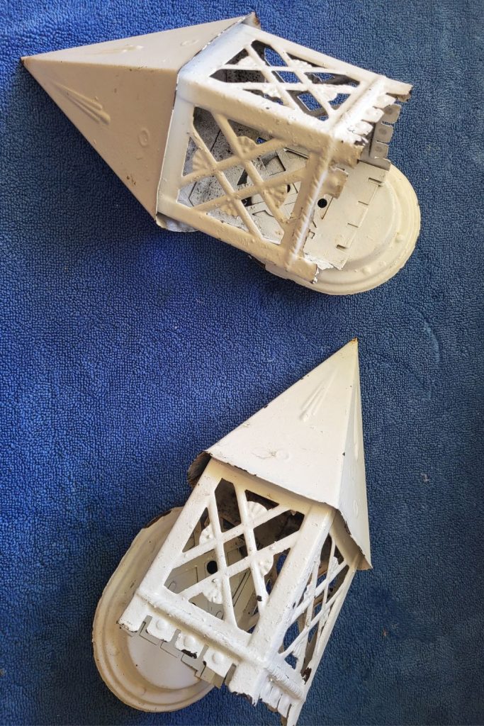 Salvaged light fixture makeover painted white for farmhouse decor.