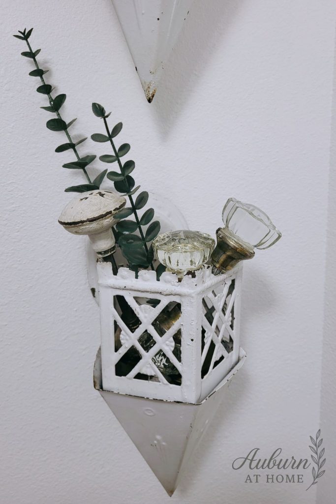 Salvaged light fixture makeover painted white for farmhouse decor.
