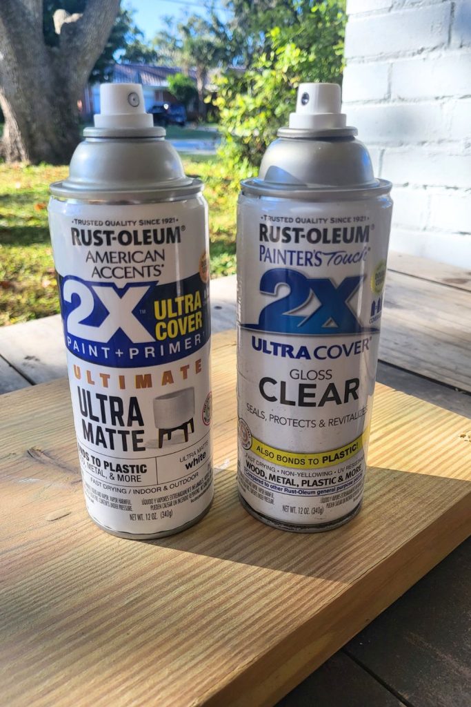 Thrifted pitcher makeover using white spray paint for farmhouse-style decor.